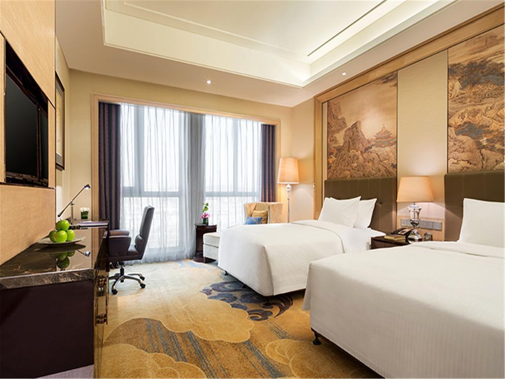 מלון Fushun  Wanda Realm Fushun מראה חיצוני תמונה